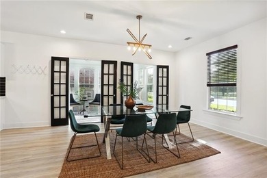 Thoughtfully renovated in 2021, this Canal Blvd residence blends - photo 6