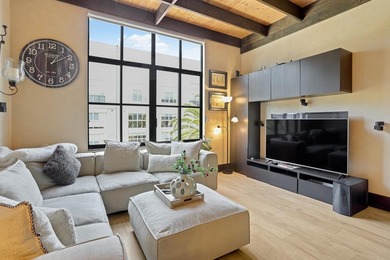 This meticulously remodeled loft captures the essence of the - photo 1