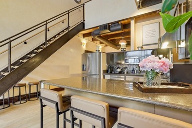 This meticulously remodeled loft captures the essence of the - photo 9