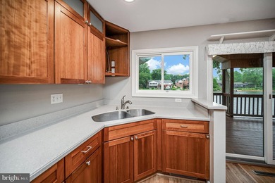 Nestled in a peaceful cove with stunning main lake views and - photo 19