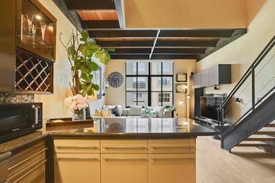 This meticulously remodeled loft captures the essence of the - photo 10