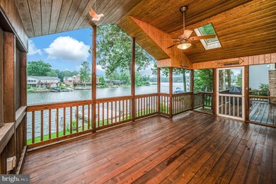 Nestled in a peaceful cove with stunning main lake views and - photo 21