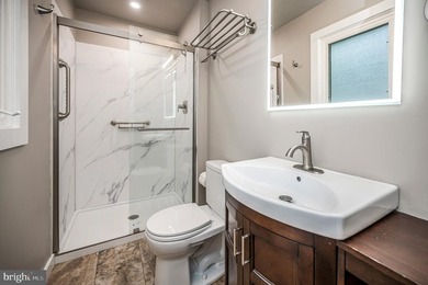 Nestled in a peaceful cove with stunning main lake views and - photo 24