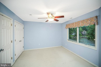 Nestled in a peaceful cove with stunning main lake views and - photo 29