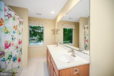 Nestled in a peaceful cove with stunning main lake views and - photo 30
