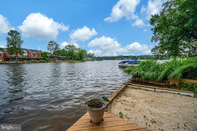 Nestled in a peaceful cove with stunning main lake views and - photo 42