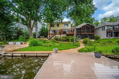 Nestled in a peaceful cove with stunning main lake views and - photo 48
