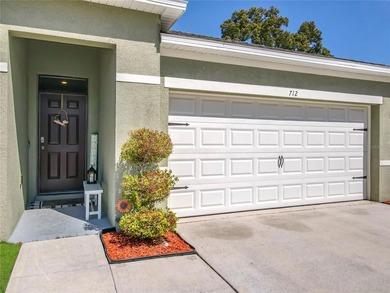 Welcome home! This cheerful 3-bedroom, 2-bath beauty is just - photo 3