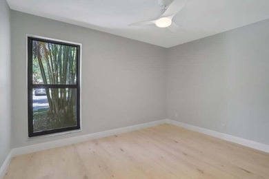 Make this beautifully remodeled 2-bedroom, 2-bath villa in - photo 17
