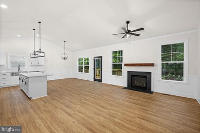 Nestled in the serene Lake of the Woods community, this stunning - photo 12