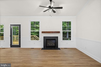 Nestled in the serene Lake of the Woods community, this stunning - photo 13