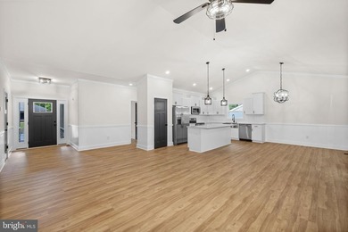 Nestled in the serene Lake of the Woods community, this stunning - photo 16