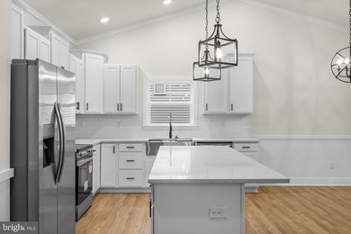 Nestled in the serene Lake of the Woods community, this stunning - photo 19