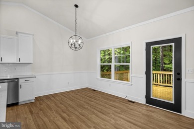 Nestled in the serene Lake of the Woods community, this stunning - photo 20