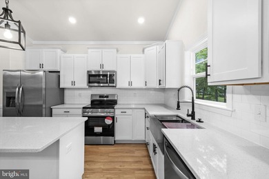 Nestled in the serene Lake of the Woods community, this stunning - photo 23