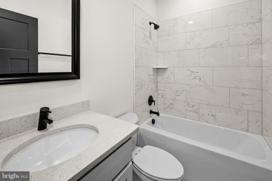 Nestled in the serene Lake of the Woods community, this stunning - photo 36