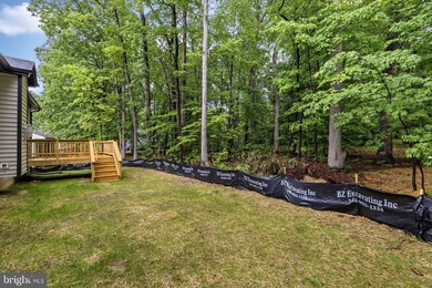 Nestled in the serene Lake of the Woods community, this stunning - photo 41