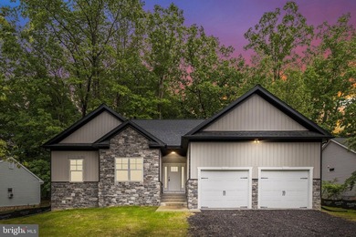 Nestled in the serene Lake of the Woods community, this stunning - photo 42