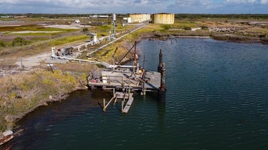 Approximate 47 acre site with canal and barge dock; direct - photo 1