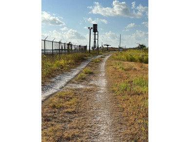 Approximate 47 acre site with canal and barge dock; direct - photo 8