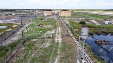 Approximate 47 acre site with canal and barge dock; direct - photo 10