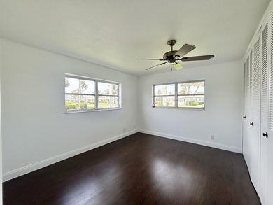 Lovely 1 bedroom 1 bath CORNER VILLA located in the 55+ - photo 19