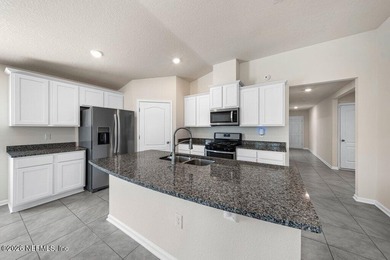 Built in 2022 and truly move-in ready, this pristine home is - photo 3