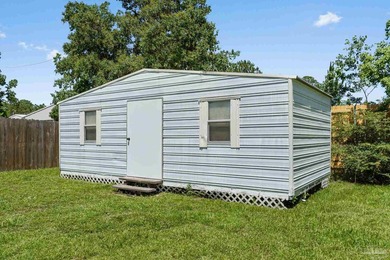 Pool home on nearly half an acre with a large backyard storage - photo 33