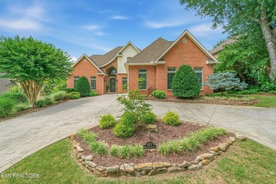 Enjoy peaceful lakefront living in this custom brick and stone - photo 2