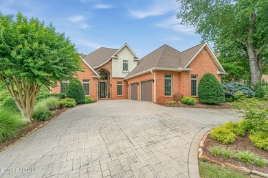 Enjoy peaceful lakefront living in this custom brick and stone - photo 3