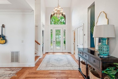 Enjoy peaceful lakefront living in this custom brick and stone - photo 4