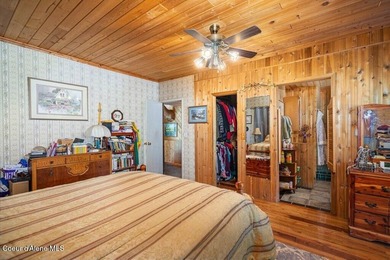 Tucked away in a private, park-like setting in North Idaho, this - photo 22