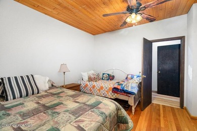 Tucked away in a private, park-like setting in North Idaho, this - photo 29