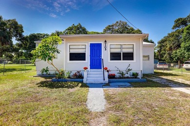 Check out this 3 BED 1 BATH home on a HUGE lot in Fort Pierce! - photo 1