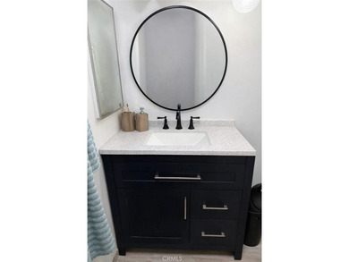 Highly desirable 4 Bedroom 2 Bathroom Two Story Home is nestled