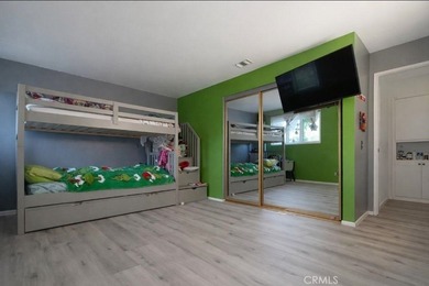 Highly desirable 4 Bedroom 2 Bathroom Two Story Home is nestled