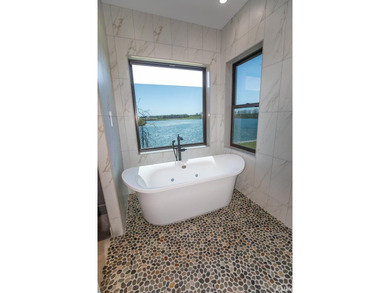 Award-winning luxury meets breathtaking waterfront views in this - photo 20
