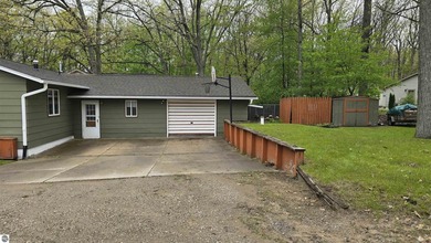 Located just minutes away from the beautiful waters of Fife Lake - photo 3