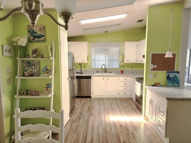 This home has it all . . . location, floorplan and personality - photo 7