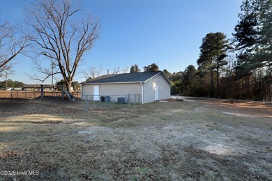 Charming retail location with tons of possibilities! Currently a