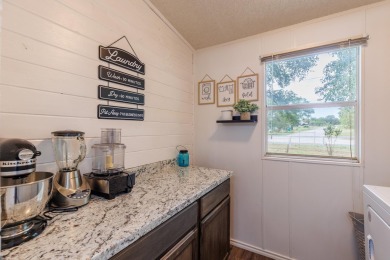 Spacious and updated manufactured home on large corner lot