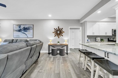 This gorgeous condo has been completely remodeled. Stunning open - photo 12
