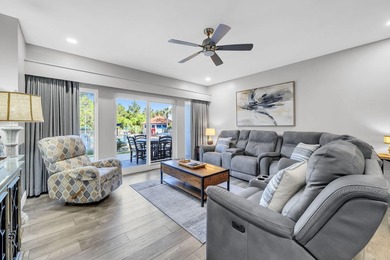 This gorgeous condo has been completely remodeled. Stunning open - photo 13