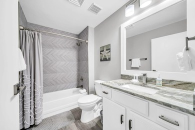 This gorgeous condo has been completely remodeled. Stunning open - photo 20