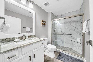 This gorgeous condo has been completely remodeled. Stunning open - photo 22