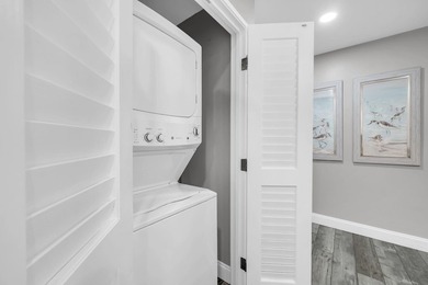 This gorgeous condo has been completely remodeled. Stunning open - photo 32