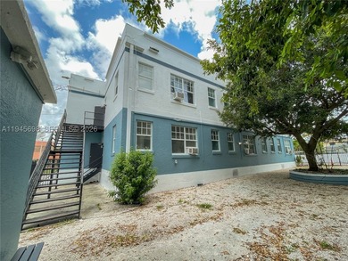 This two-story building features a desirable unit mix catering - photo 2