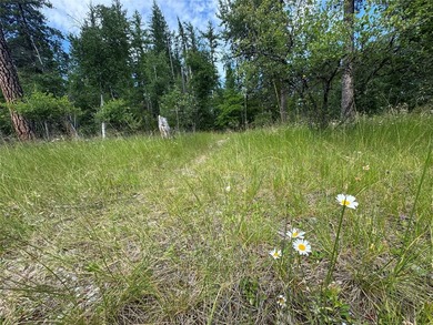 Tucked into a peaceful pocket near Swan Lake, this .67-acre lot - photo 17
