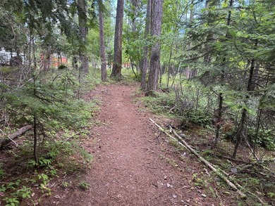 Tucked into a peaceful pocket near Swan Lake, this .67-acre lot - photo 20