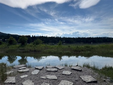 Tucked into a peaceful pocket near Swan Lake, this .67-acre lot - photo 22